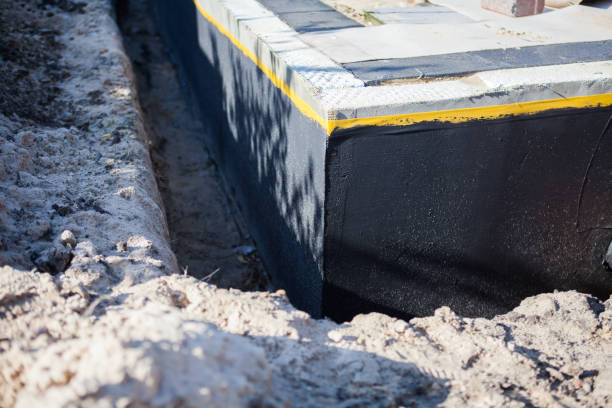 Professional Waterproofing technician working in Columbia, SC